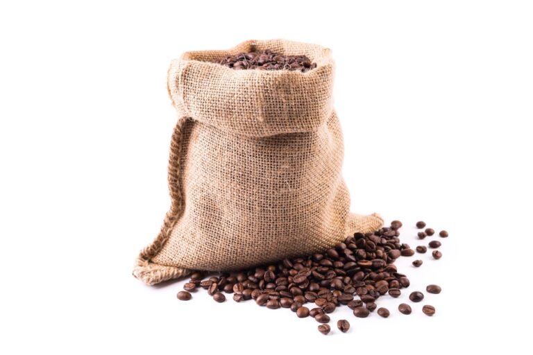 jute sack with coffee beans on white background